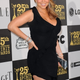 Image for article titled Mariah Sparks Pregnancy Rumors, Sandra Accepts Her Razzie Awards, And Oscar Gossip Galore